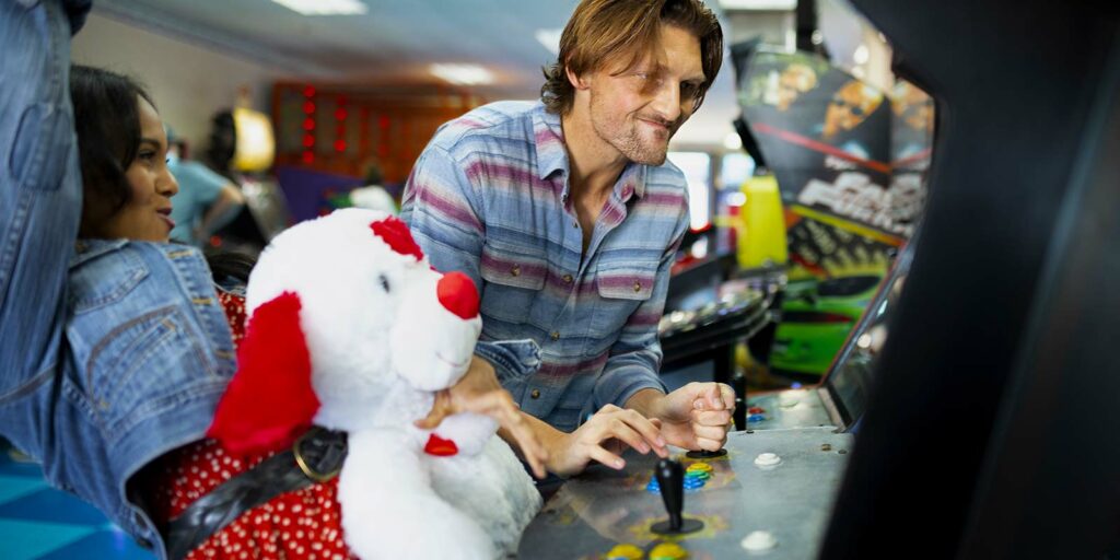 couple playing in arcade